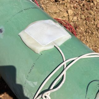 Green pipe with sensor attached